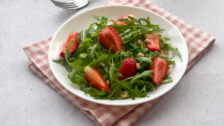 Basil Olive Oil arugula salad with pine nuts and strawberries